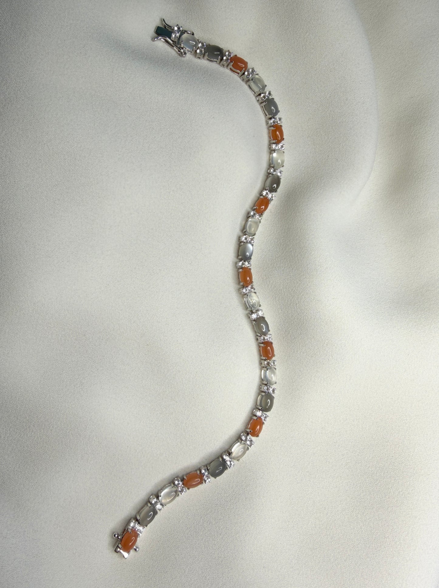 Peach, gray and white moonstone tennis bracelet