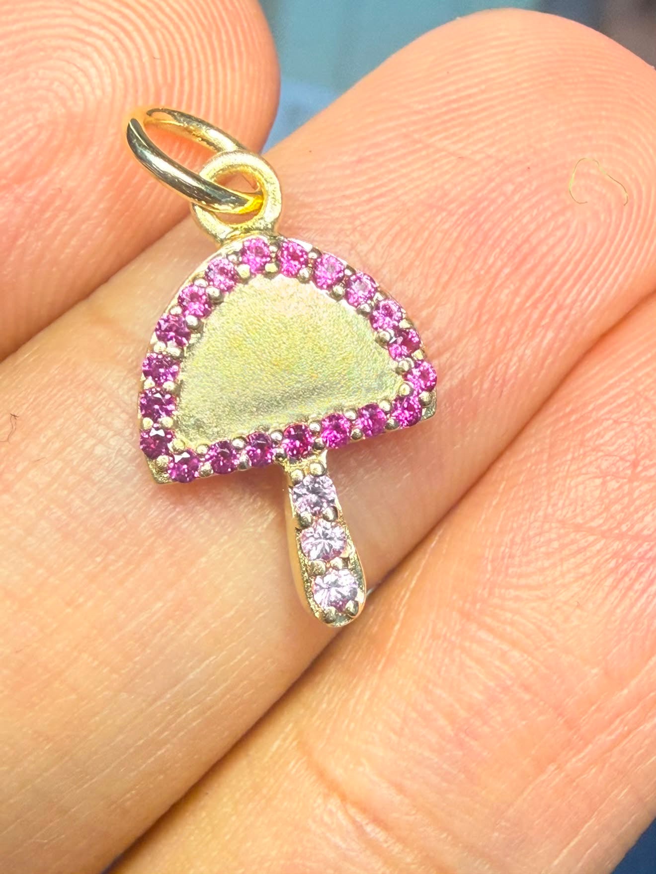 10k yellow gold mushroom charm with vibrant pink and light pink natural sapphires
