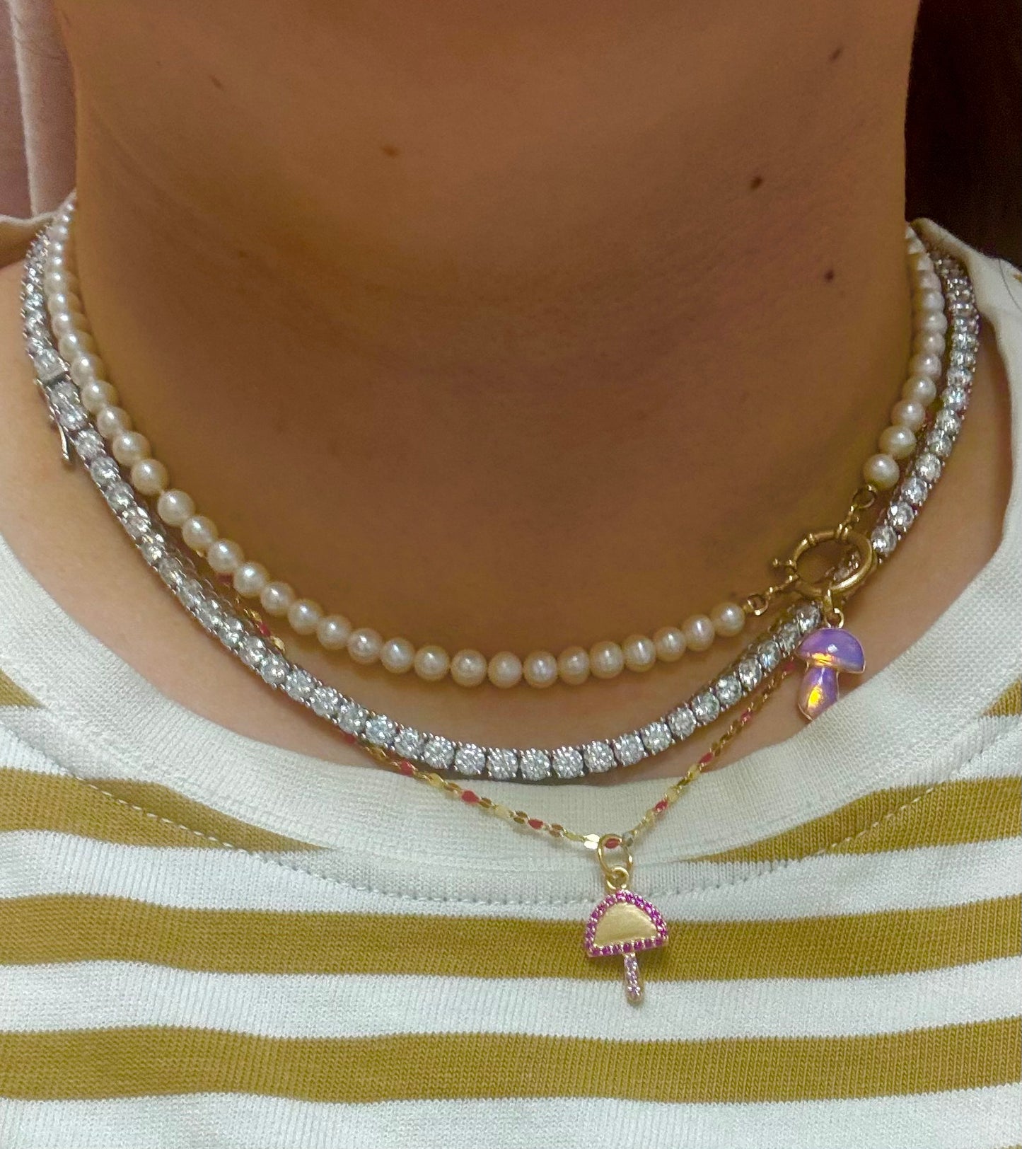 10k yellow gold mushroom charm with vibrant pink and light pink natural sapphires