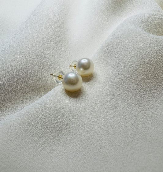 Ivory pearl stud earrings set in 14k gold